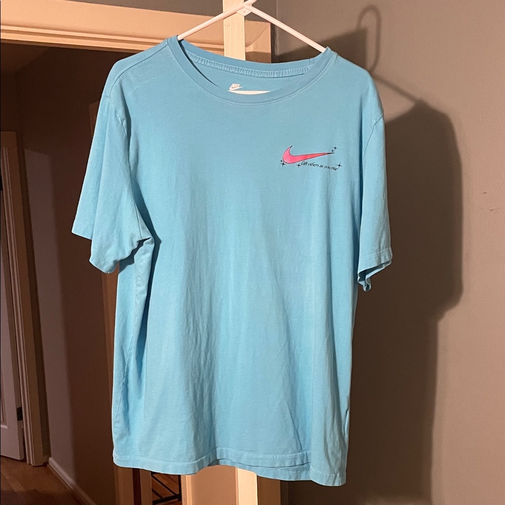 Nike Men's Light Blue Tee with Pink Logo